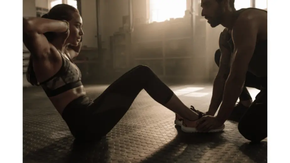 two people doing sit ups